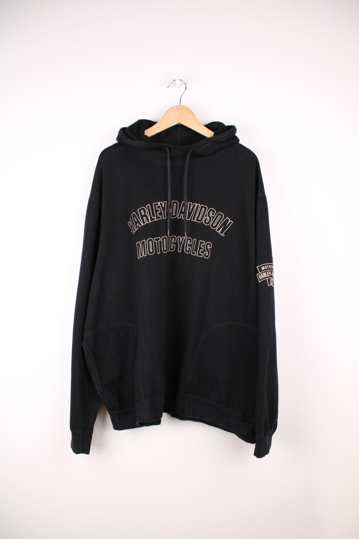 Harley-Davidson all black spell-out hoodie with embroidered text on the front and printed eagle motif on the back 