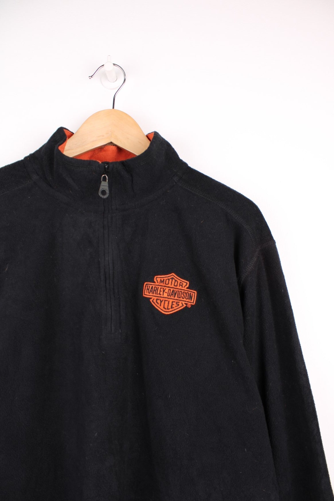 Harley-Davidson all black 1/4 zip fleece with embroidered spell-out logo on the chest