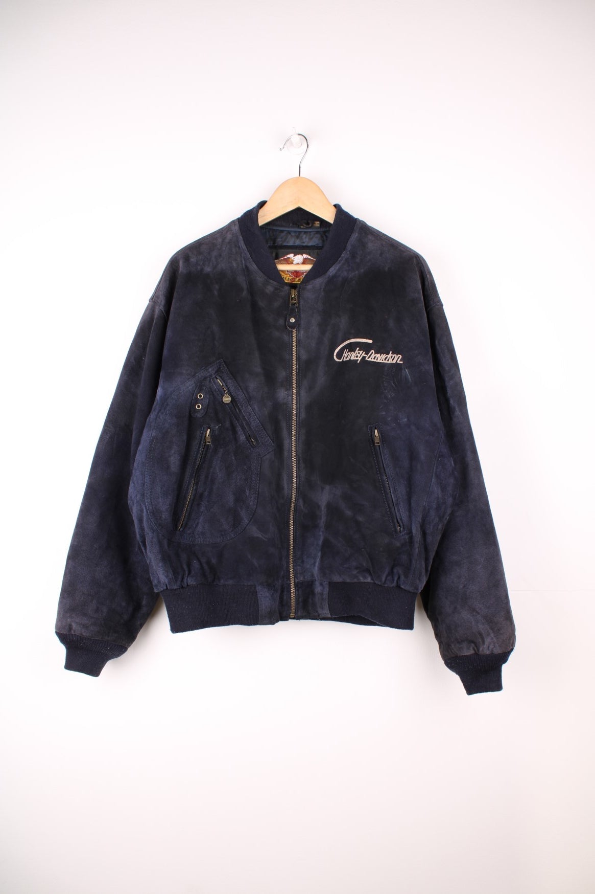 Vintage rare Harley-Davidson v-twin power navy blue suede bomber jacket with embroidered detail on the chest and large spell-out motif on the back with raised engine embellishments 