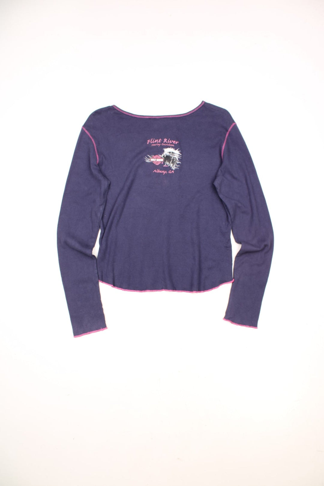 Harley-Davidson women's long sleeve top in purple with pink contrast stitching. Features printed graphic on the front and lace up detailing