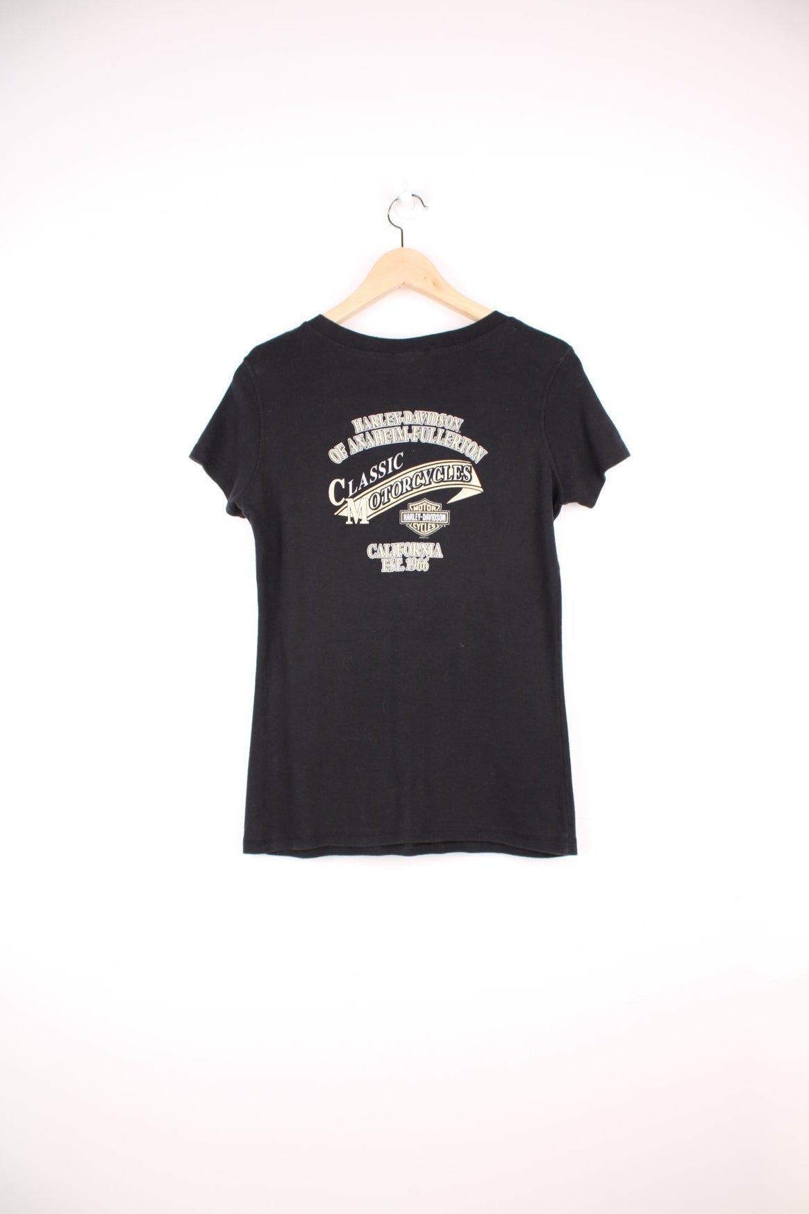 Harley Davidson Y2K Baby Tee in a black colourway, button up tee and has the spell out logo design printed on the front and back. 