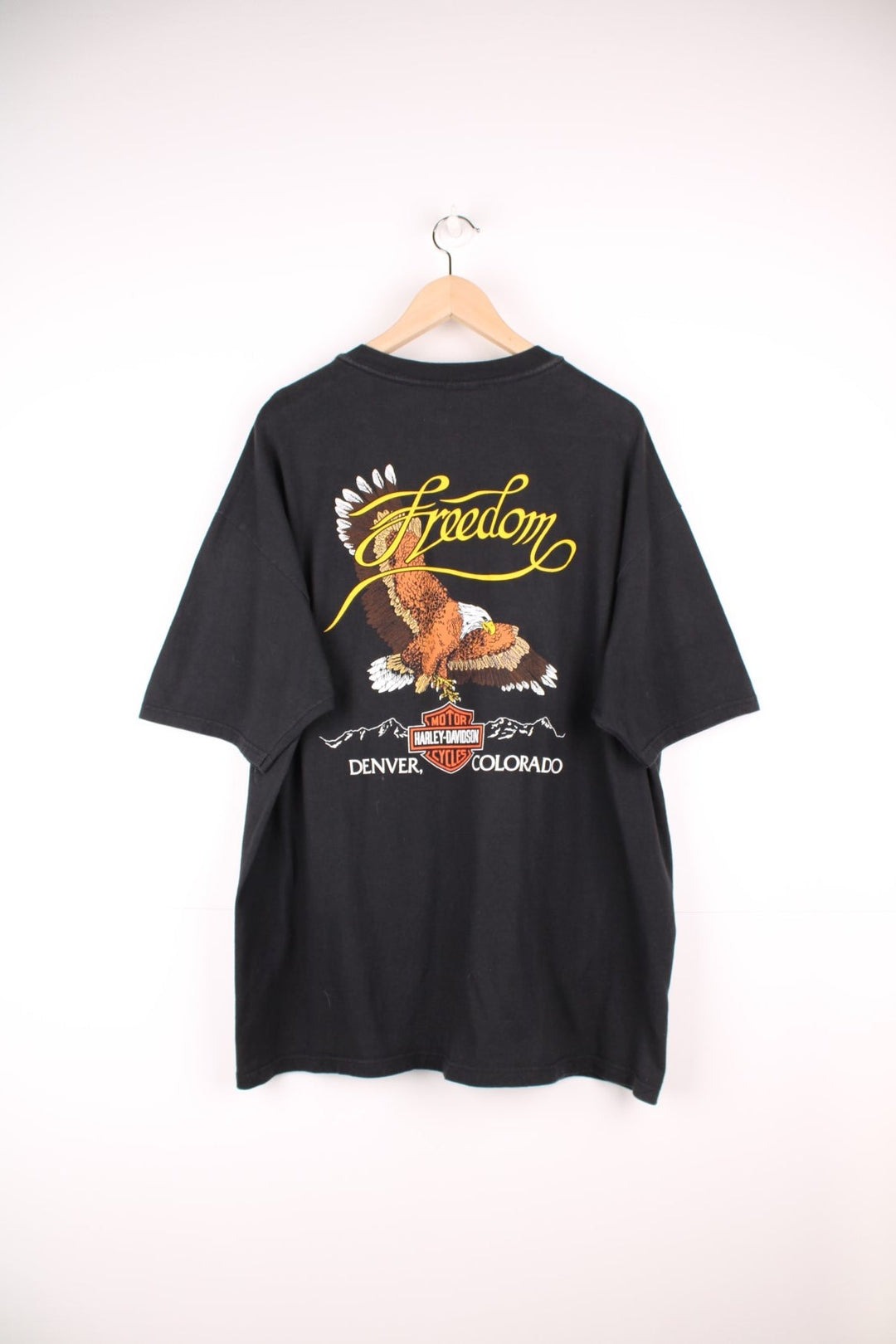 Vintage 90s Harley Davidson Denver, Colorado T-Shirt with chest pocket and graphic eagle print on the back. 