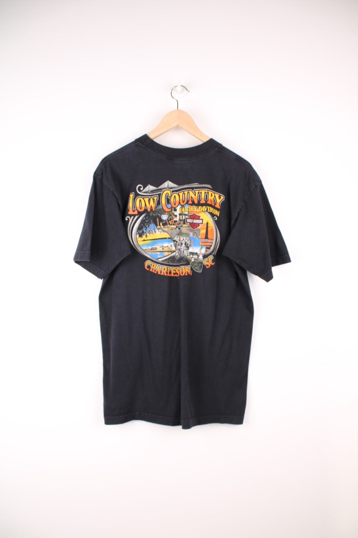 2005 Harley Davidson Charleston, SC T-Shirt with spell out logo and eagle print on the front, and graphic print on the back.