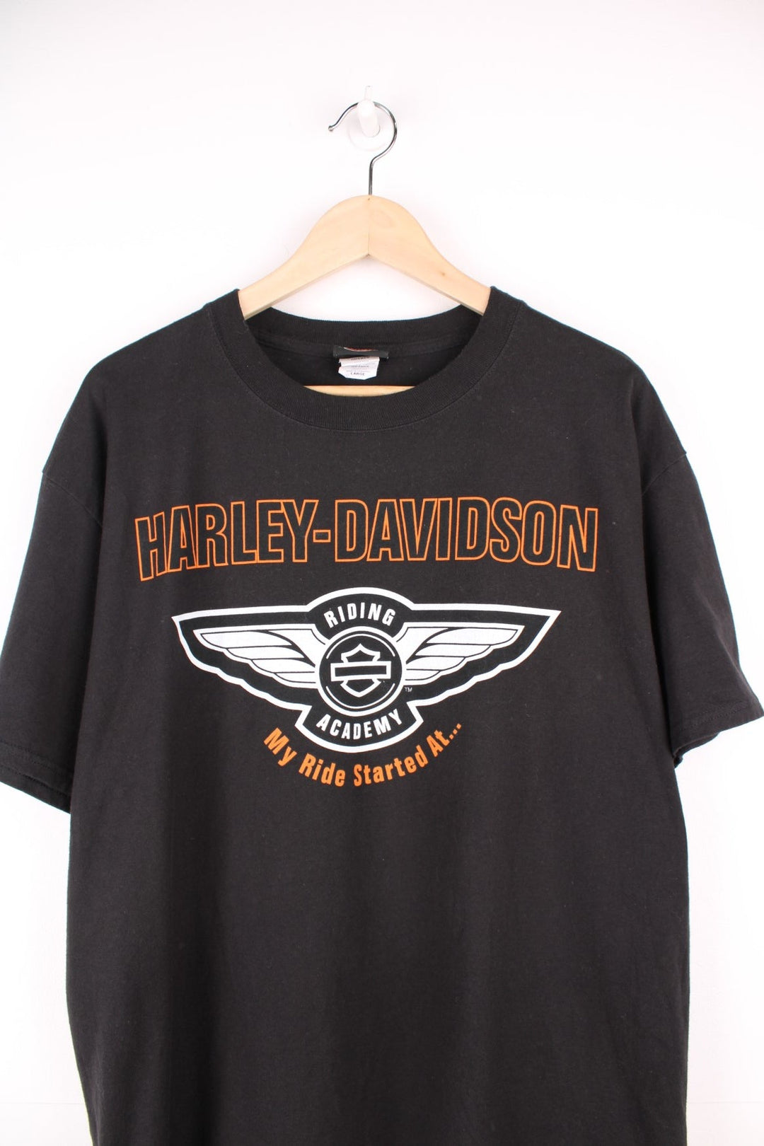 Harley Davidson Ray Price, Raleigh, NC T-Shirt with spell out logo across the chest and back.