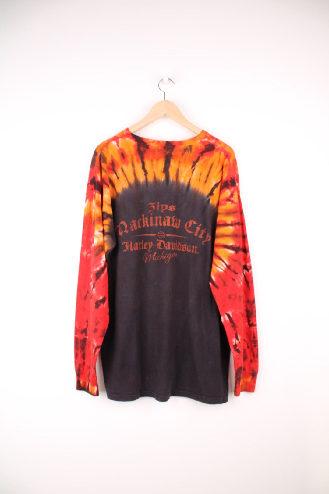 Harley Davidson long sleeved tie dye T-Shirt in black, orange and red. Features printed spell out logo across the chest. 