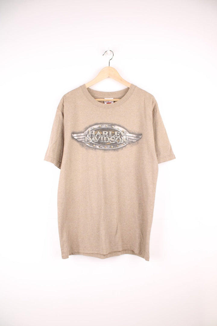 Vintage Harley Davidson Downtown Seattle T-Shirt in light brown. Features printed spell out logo across the chest and graphic print on the back.