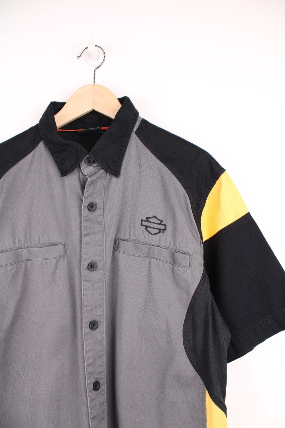 Harley Davidson grey, black and yellow button through shirt with chest pockets and embroidered spell out logo across the back. 