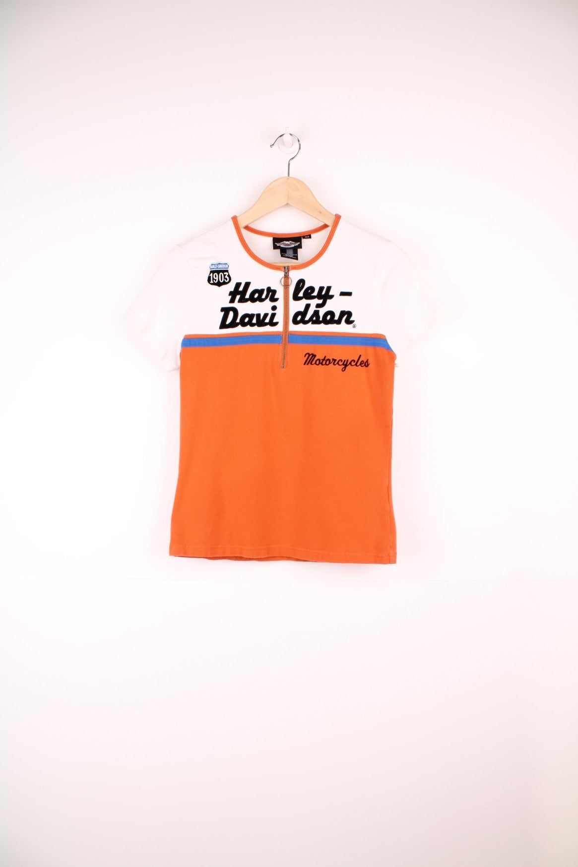 Vintage Harley Davidson orange and white Baby Tee with ring pull zip fastening, and embroidered spell out logo across the chest.