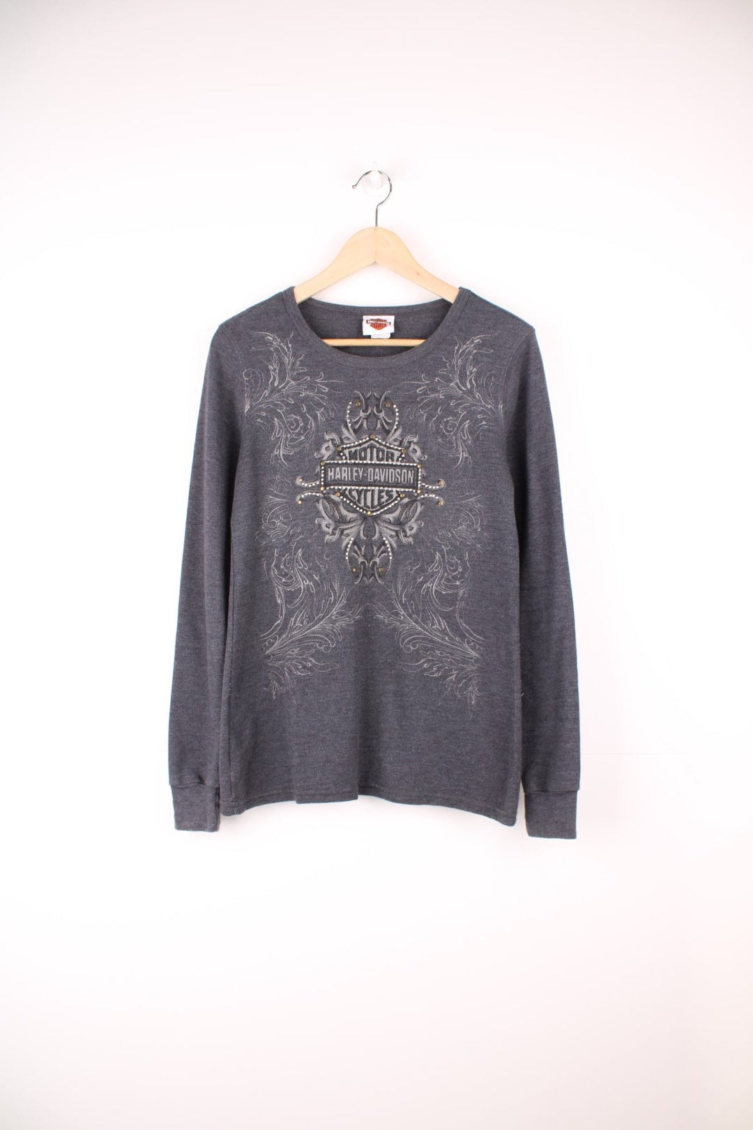 Vintage Harley Davidson grey long sleeved top with logo on the front, silver gems and brass studs. 