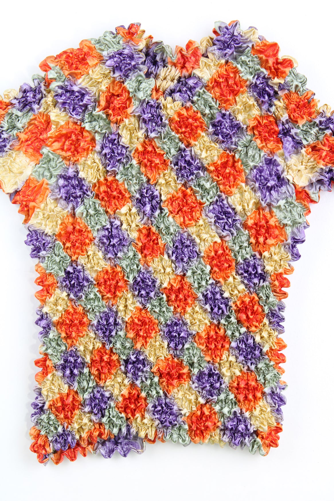 Orange, purple and yellow diamond print popcorn top. good condition - some loose threads Size in Label: No size - stretches to fit sizes XS - XL