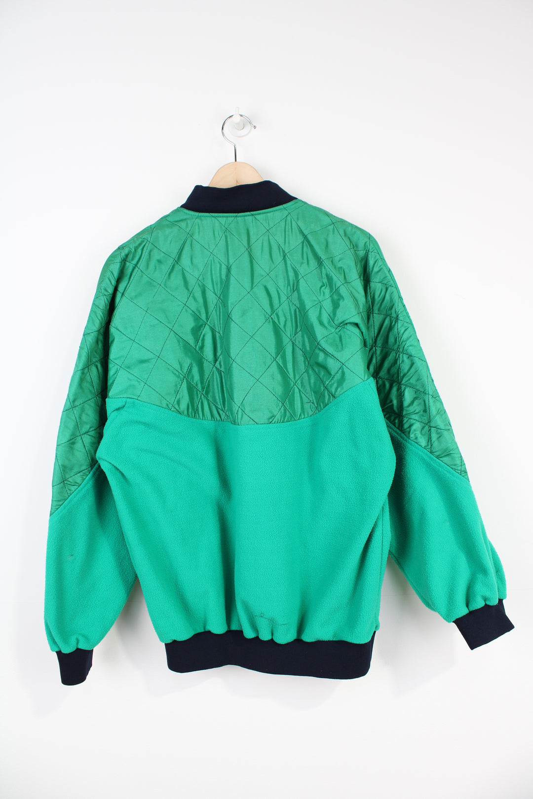 Vintage green 1980's Umbro 1/4 zip fleece with embroidered logo on the front 