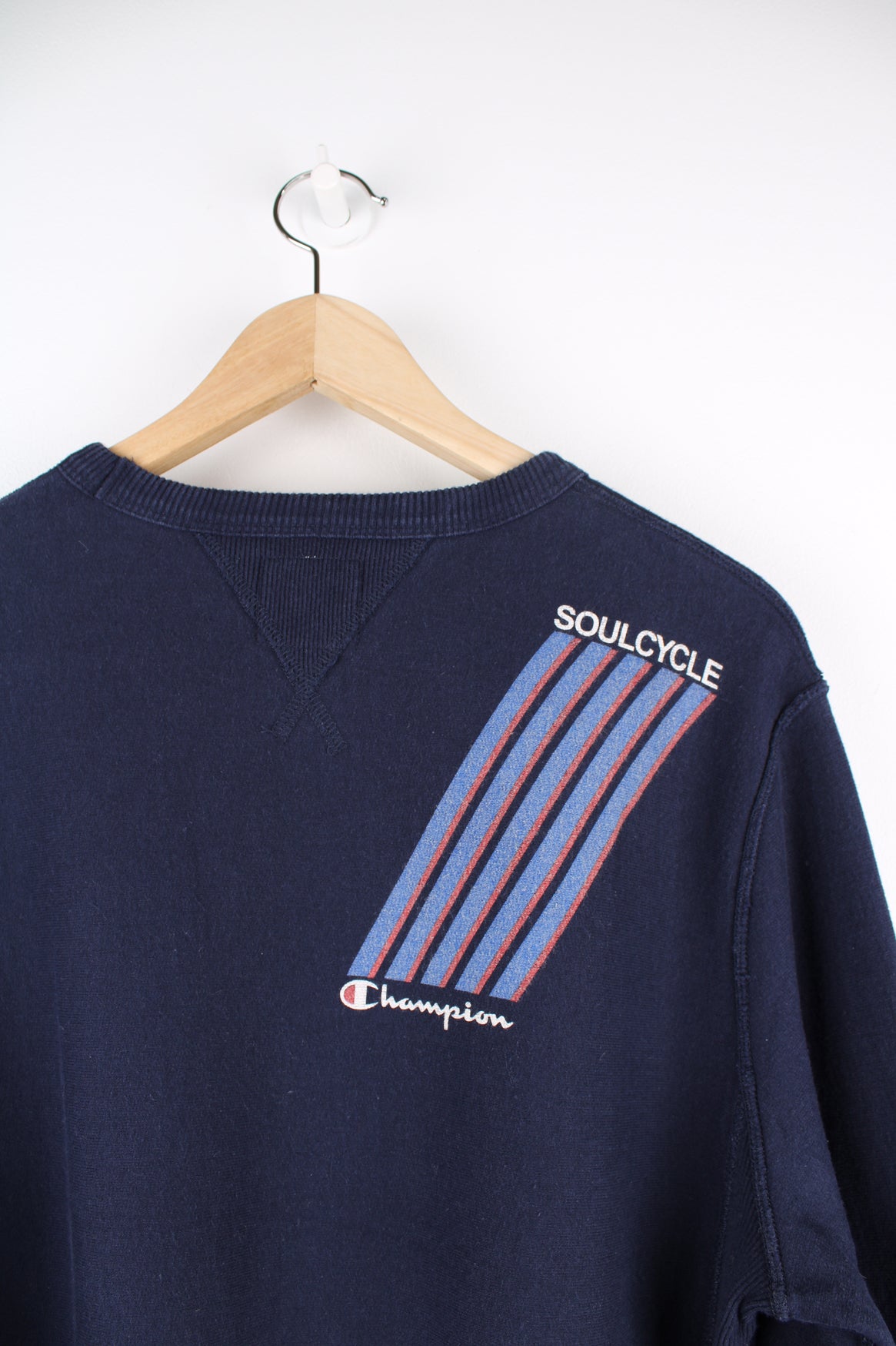 Champion x Tom Snyder Soul Cycle Sweatshirt in a blue colourway, crewneck, and has the logos printed on the front and back.