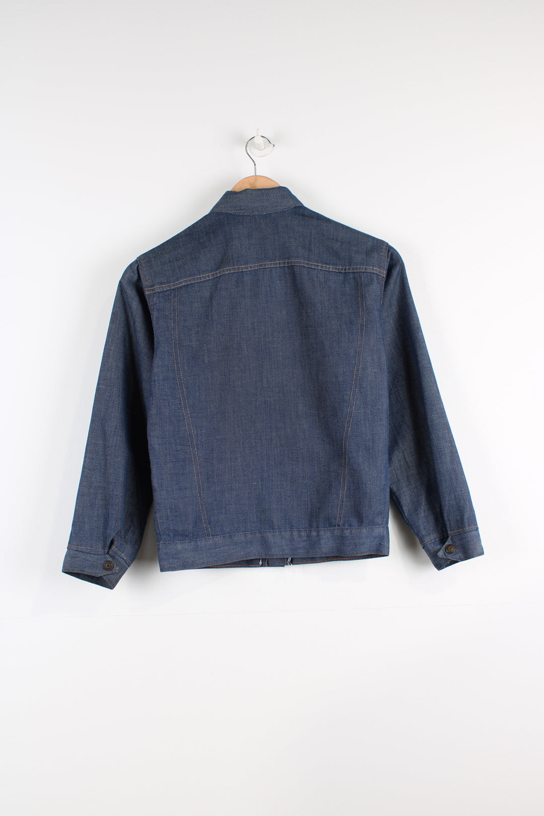 Vintage Levi's trucker style denim jacket in blue, button up with two pockets on the chest. 