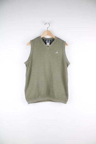 Adidas Golf Light Sweater Vest in a khaki green colourway, v neck, and has the logo embroidered on the front and back.