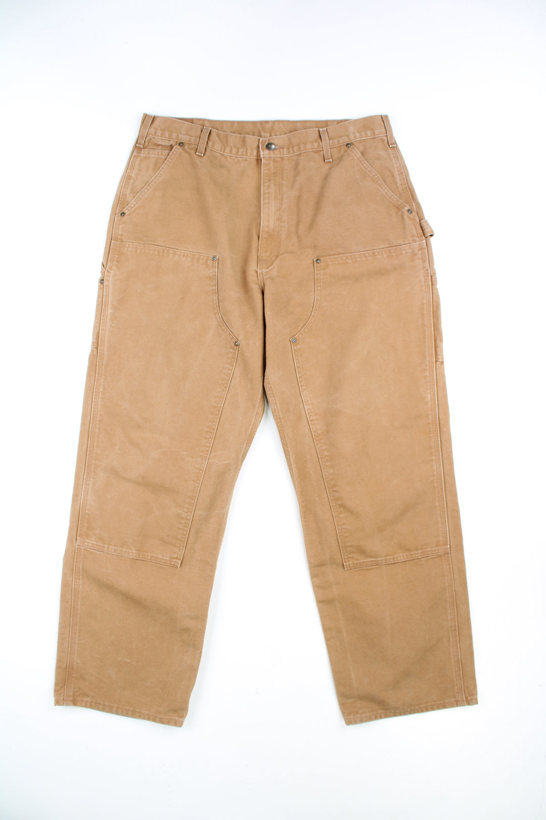 Tan Carhartt double knee carpenter jeans with multiple pockets with logo on the back pocket 