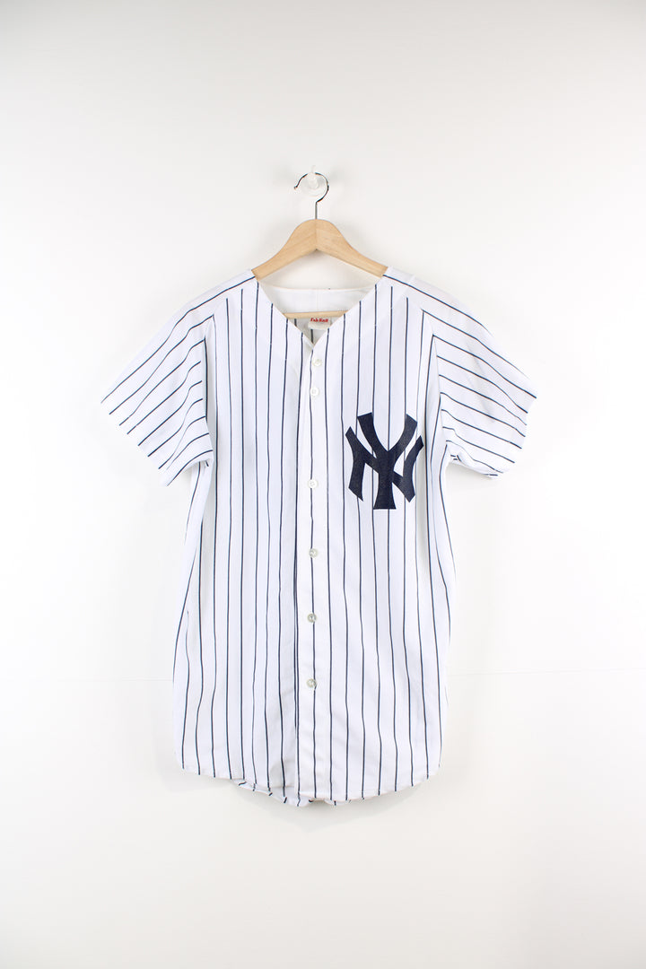 Vintage 80's New York Yankees baseball jersey with #23 printed on the back. The shirt is single stitch made by Fab-Knit.  good condition  Size in Label:  S  Our Measurements:  Chest: 21 inches