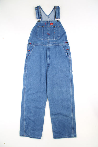 Dickies blue denim carpenter style full length dungarees with multiple pockets and embroidered logo on the chest 