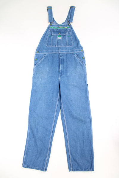 Vintage Liberty light wash denim carpenter style dungarees with embroidered log on the zip up pocket 