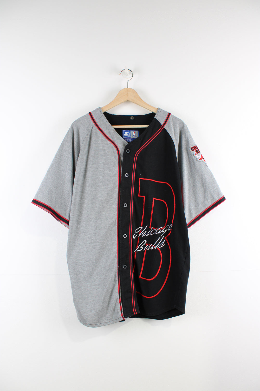 Vintage 90's Chicago Bulls/ NBA Starter baseball jersey. Grey and black jersey with embroidered team logo details.   good condition  Size in Label:  Mens L  Our Measurements:  Chest: 24 inches Length: 31 inches