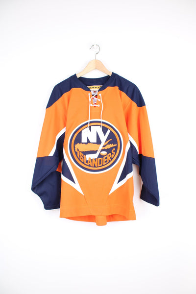 New York Islanders NHL hockey jersey in orange and navy blue with embroidered badges and drawstring fastening by Koho. 