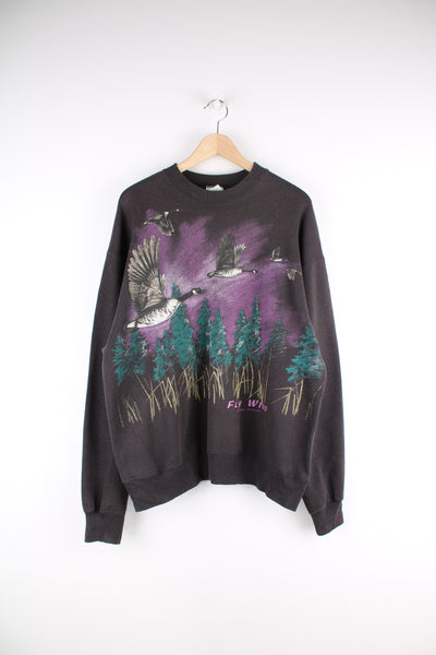 Vintage National Wildlife Graphic Sweatshirt in black colourway, and has big duck graphic design printed across the front.