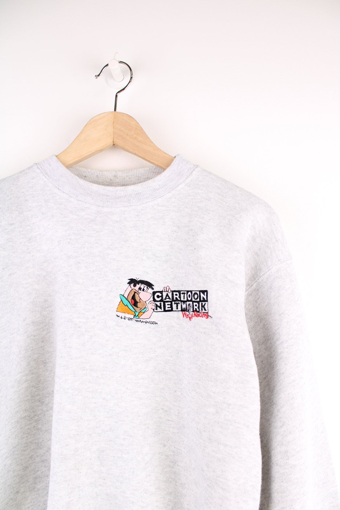 Vintage Cartoon Network Wacky Racing Sweatshirt in a grey colourway with the logo embroidered on the front.