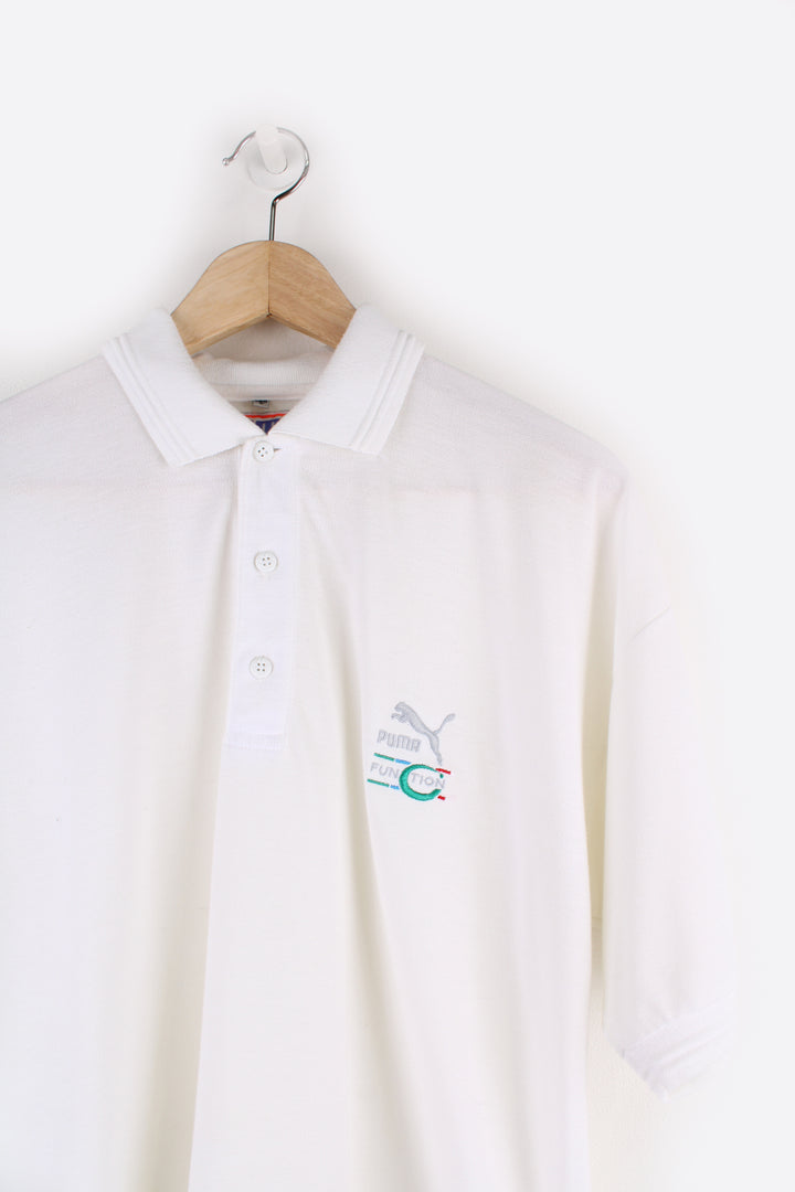 Puma Function Polo Shirt in a white colourway, button up collar, short sleeved and has the logo embroidered on the front and back.