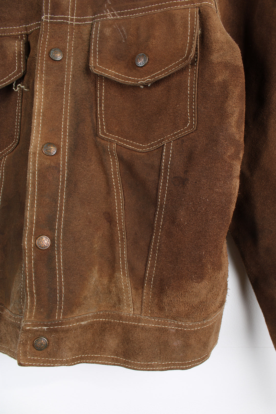 Vintage Western suede leather jacket in brown, button up with a camp collar, two pockets on the chest and contrast stitching throughout.