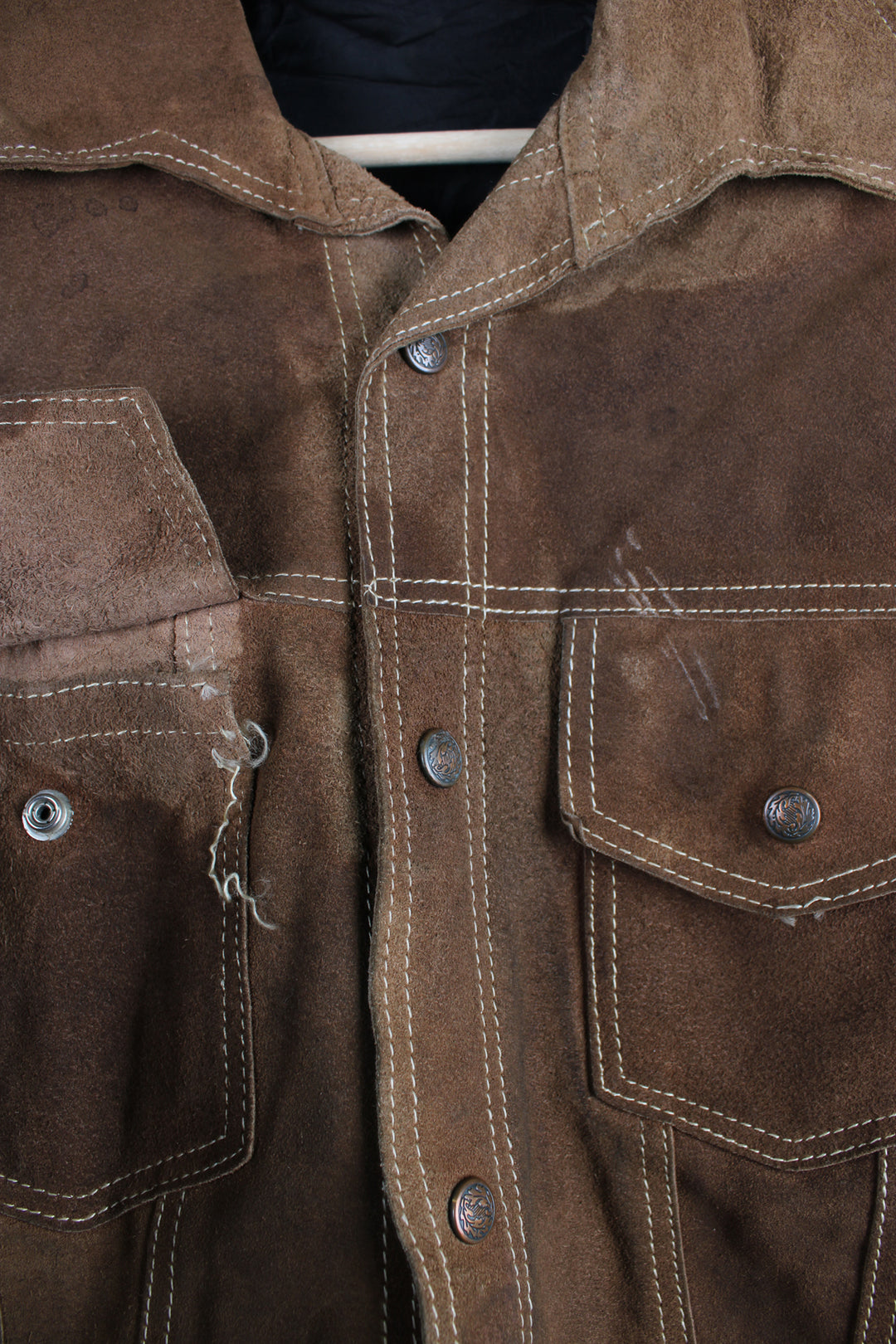 Vintage Western suede leather jacket in brown, button up with a camp collar, two pockets on the chest and contrast stitching throughout.