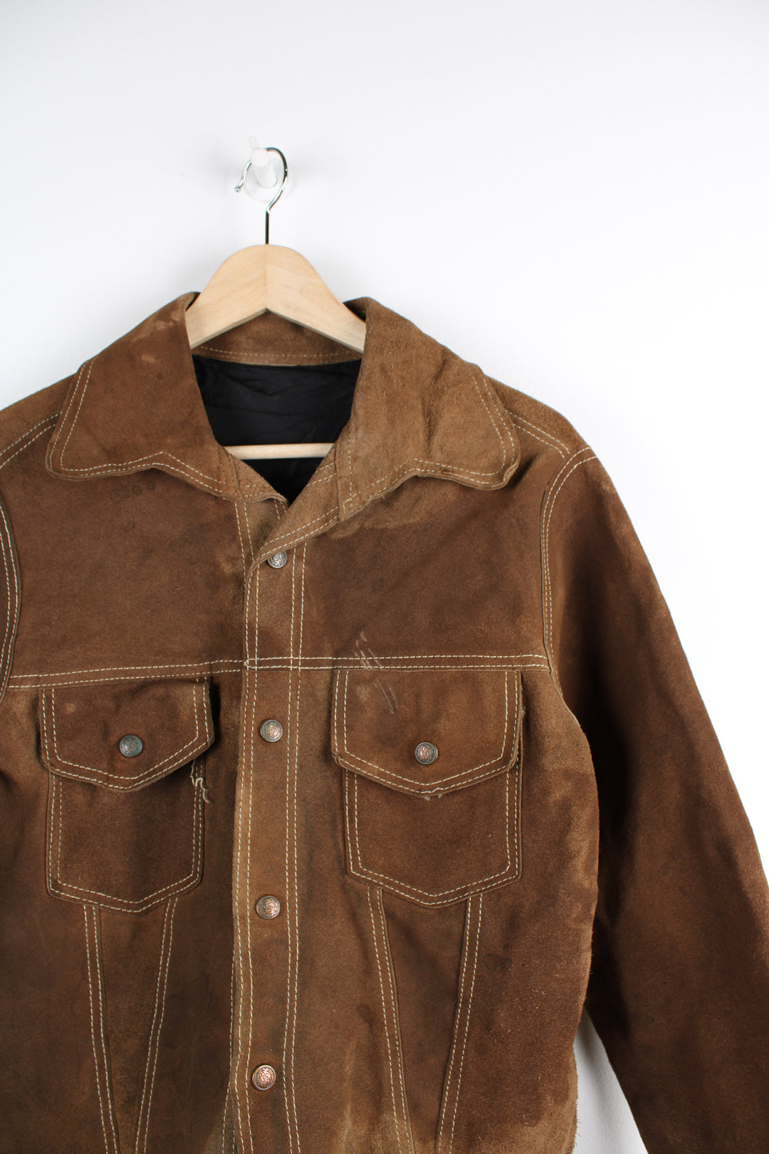 Vintage Western suede leather jacket in brown, button up with a camp collar, two pockets on the chest and contrast stitching throughout.