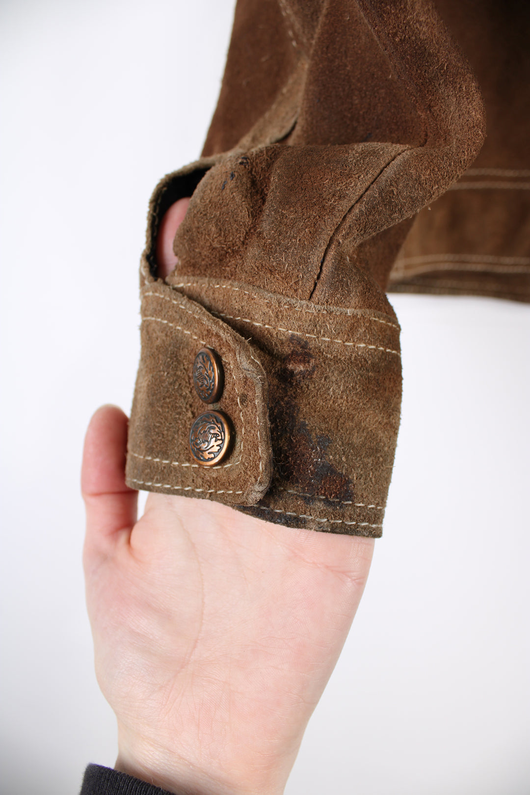 Vintage Western suede leather jacket in brown, button up with a camp collar, two pockets on the chest and contrast stitching throughout.