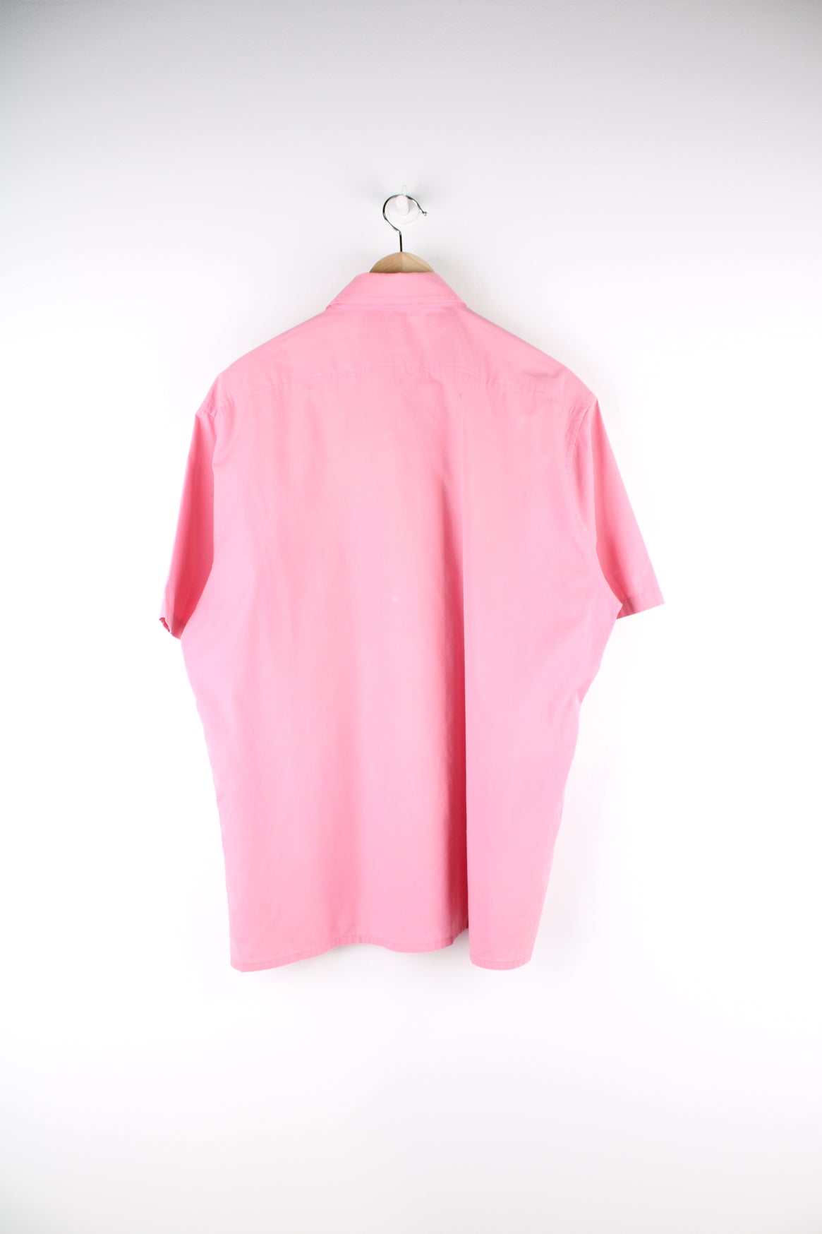 Vintage YSL short sleeve shirt in pink with chest pocket, features embroidered logo on the pocket