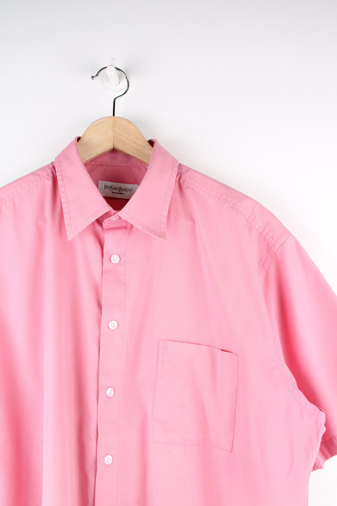 Vintage YSL short sleeve shirt in pink with chest pocket, features embroidered logo on the pocket