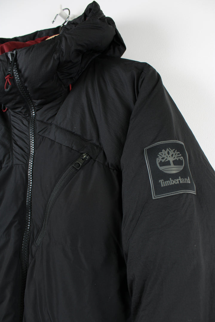 All black Timberland Neo Summet puffer jacket with full zip and hood