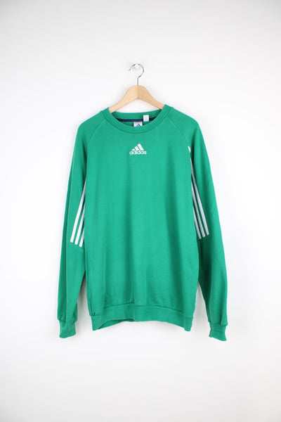 90's Style Adidas green crewneck sweatshirt with signature embroidered logo on the chest and white three stripe details under the arms