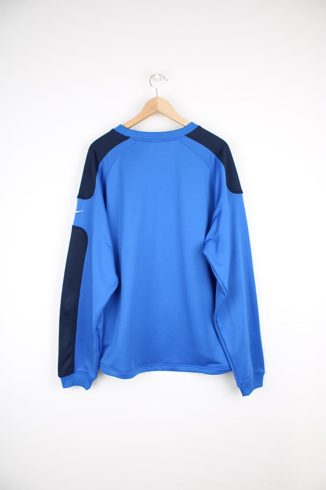 2000's bright blue nylon / training style crewneck sweatshirt by Nike, features embroidered logo on the chest