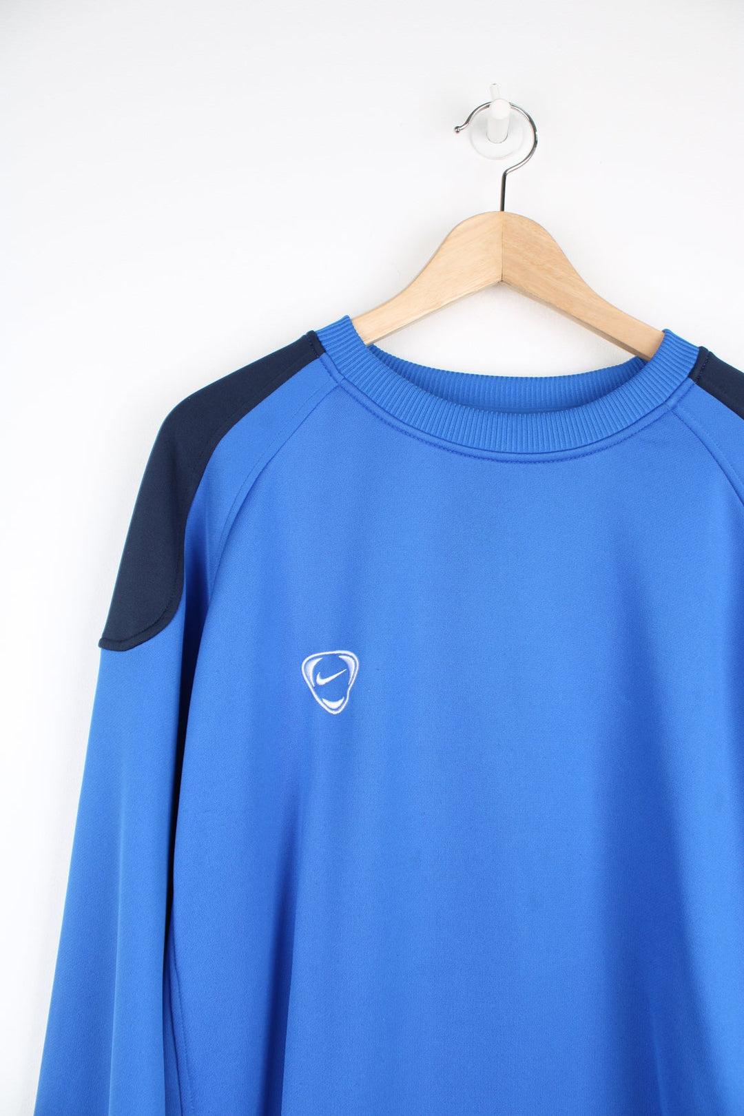 2000's bright blue nylon / training style crewneck sweatshirt by Nike, features embroidered logo on the chest