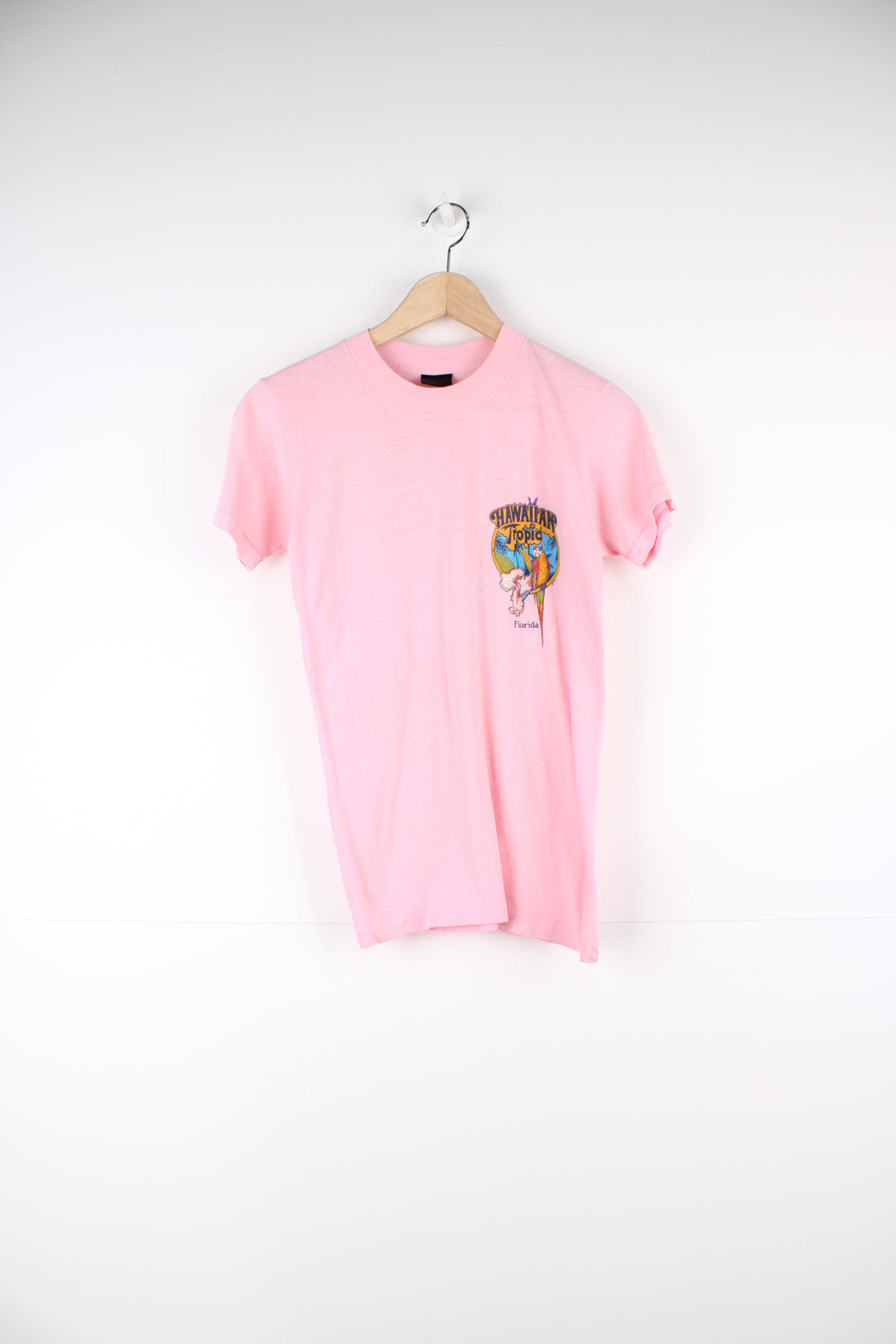 Vintage 1982 Hawaiian Tropic, Florida pink slim fit single stitch t-shirt with printed graphic on the front and back 