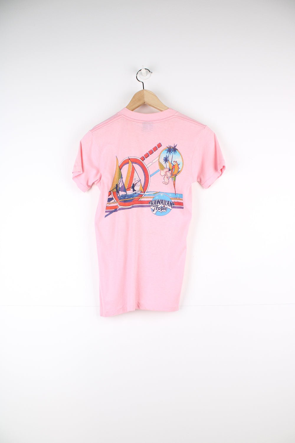 Vintage 1982 Hawaiian Tropic, Florida pink slim fit single stitch t-shirt with printed graphic on the front and back 