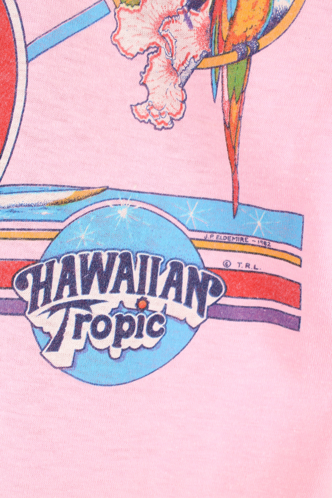 Vintage 1982 Hawaiian Tropic, Florida pink slim fit single stitch t-shirt with printed graphic on the front and back 