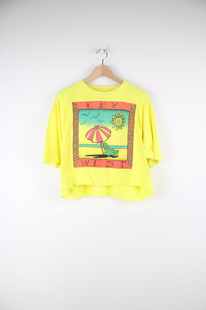 Vintage 90's 'Key West' beach scene graphic cropped t-shirt in yellow, with single stitching by Surf Style brand