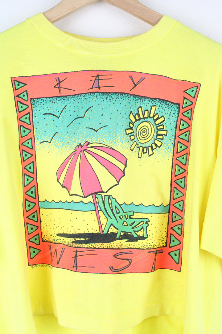 Vintage 90's 'Key West' beach scene graphic cropped t-shirt in yellow, with single stitching by Surf Style brand