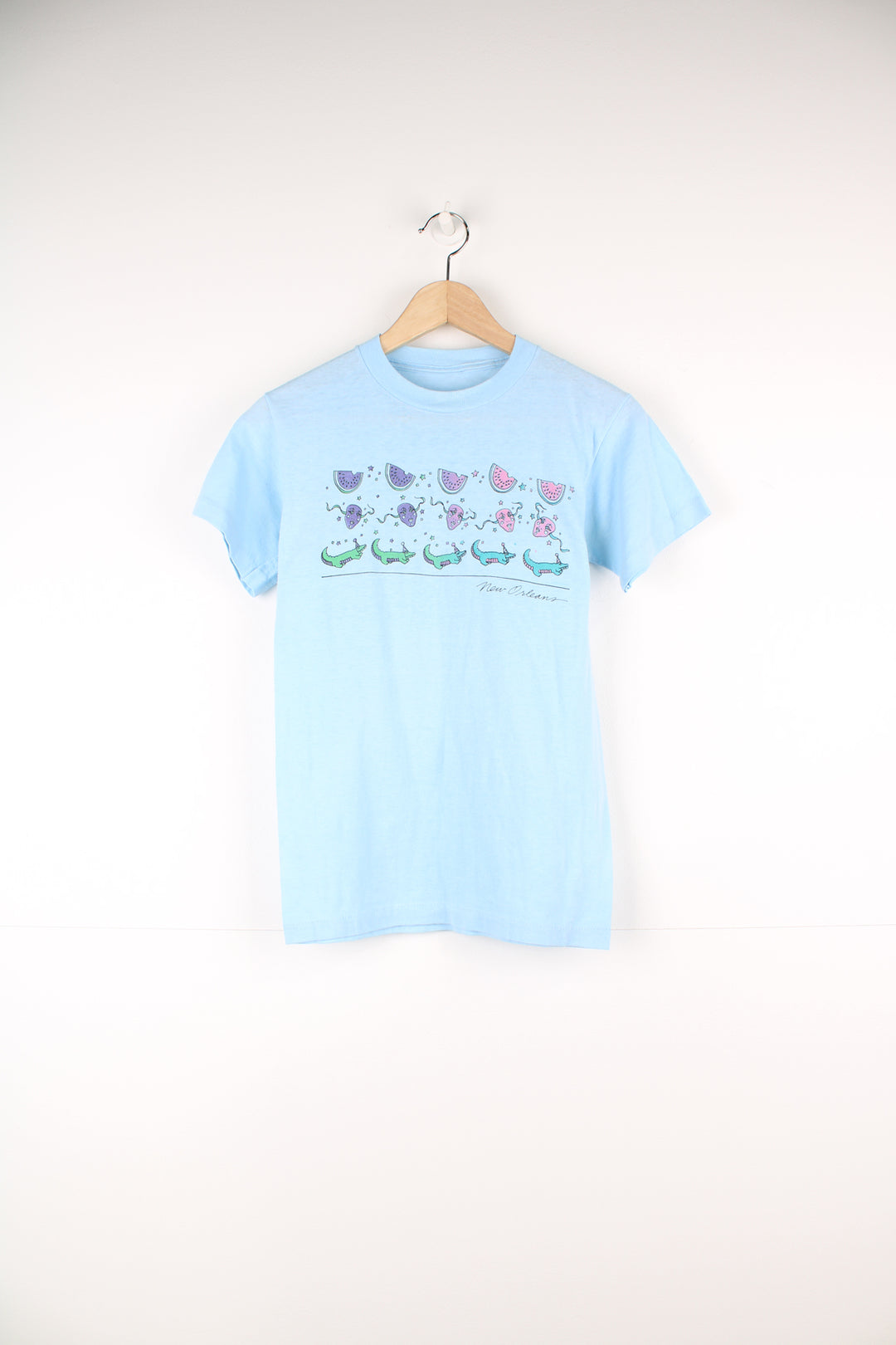 Vintage 70's/80's New Orleans baby blue, single stitch graphic tee with watermelon print/crocodile print on the front. 