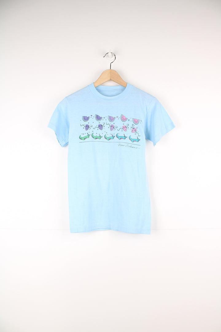 Vintage 70's/80's New Orleans baby blue, single stitch graphic tee with watermelon print/crocodile print on the front. 