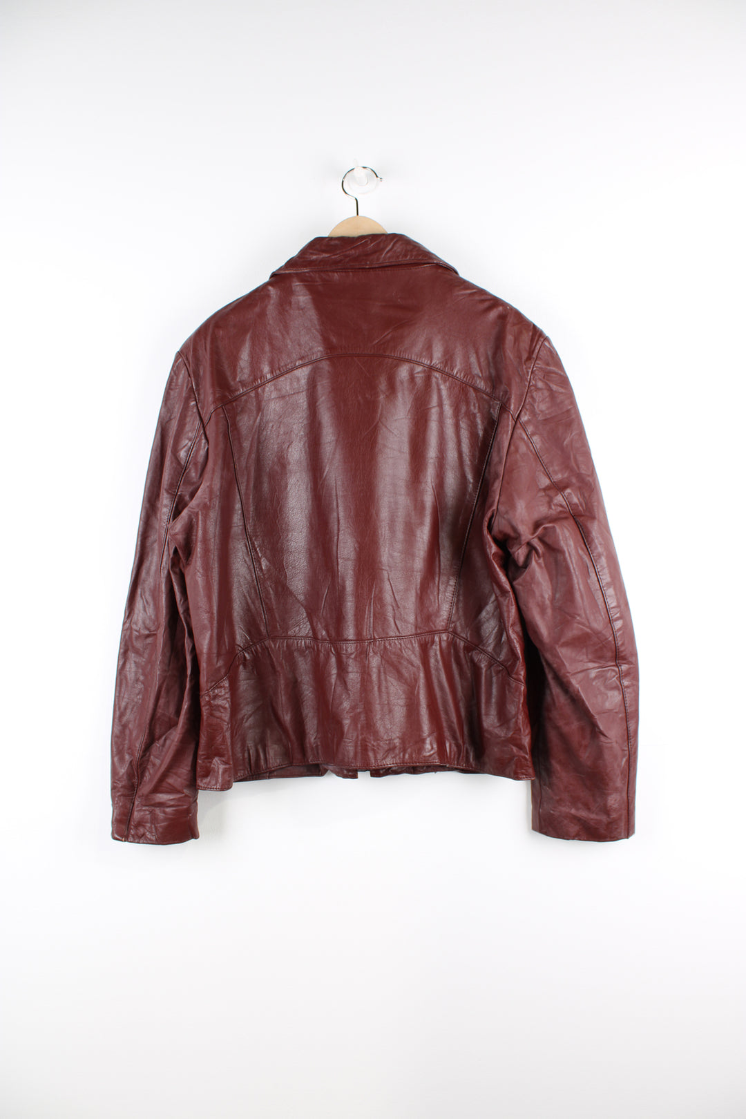 Vintage 1970's maroon leather jacket with zip to close. 