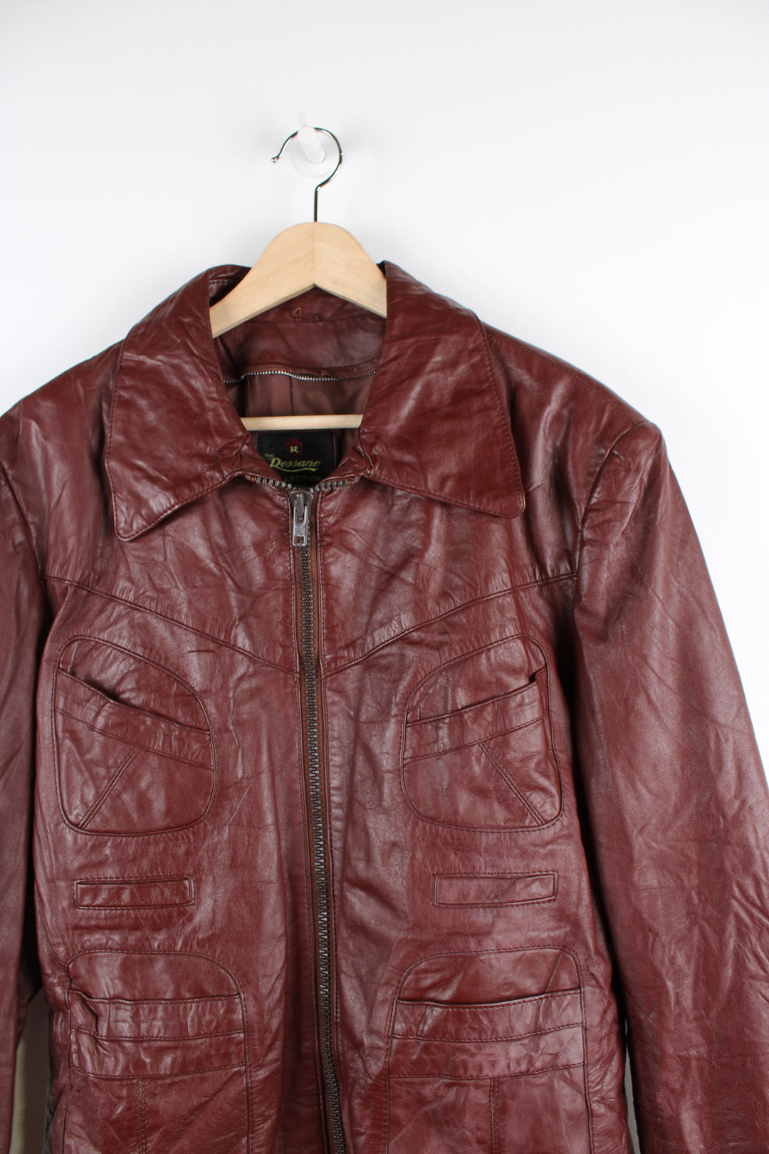 Vintage 1970's maroon leather jacket with zip to close. 