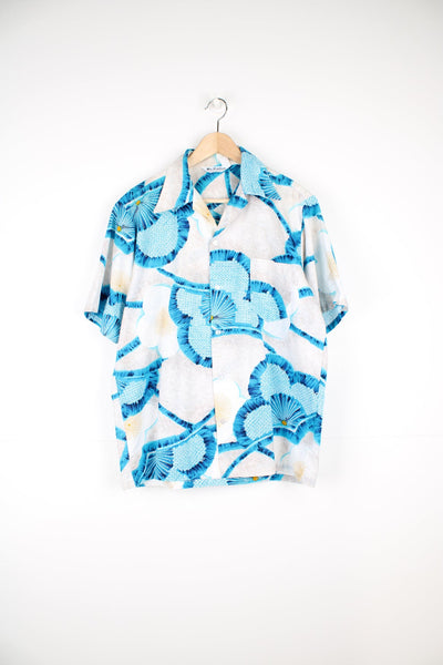 Vintage Mr.Kailua Hawaiian Shirt with blue flower print and chest pocket.