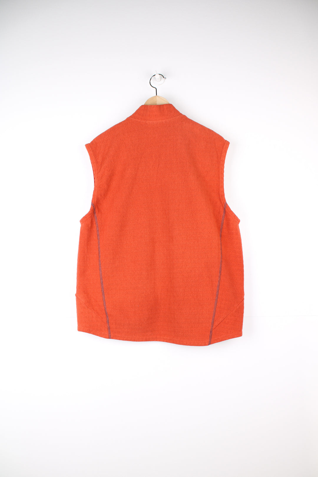 Nike Sphere Fleece Gilet in a orange colourway, zip up with side pockets, and has the logo embroidered on the front.