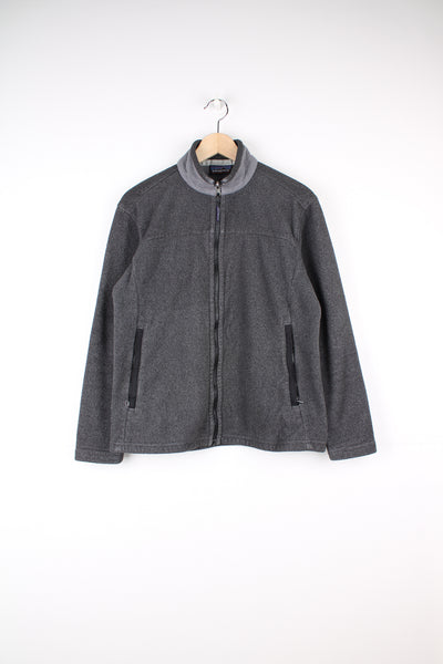 Patagonia Synchilla Fleece in a grey colourway, zip up with side pockets.