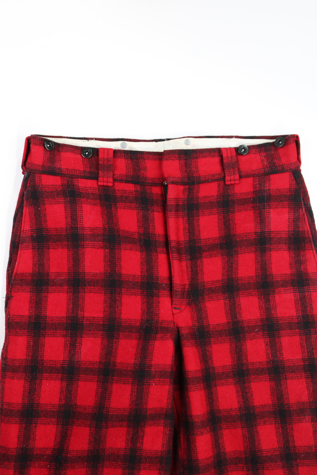  Vintage 60's Woolrich hunting trousers. Red check wool trousers with elasticated cuffs and quilted lining.   good condition - one small mark on the leg (see photos)  Size in Label:  Mens 32 (M)  Our Measurements:  Waist: 33 inches  Leg Inseam: 32 inches